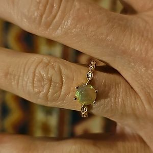 Ethiopian opal yellow gold ring